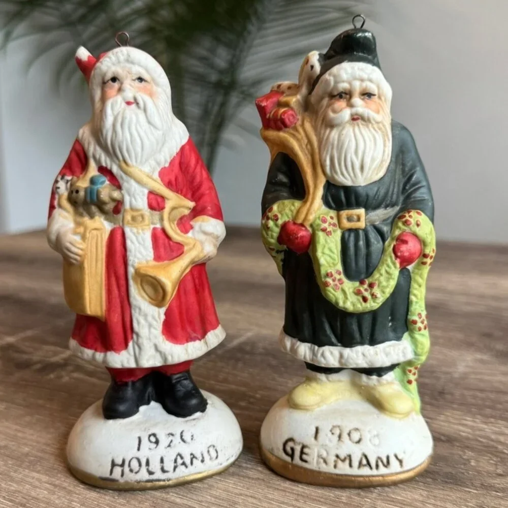 Set of 2, Around The World Collection of Santa Claus Figurine's.